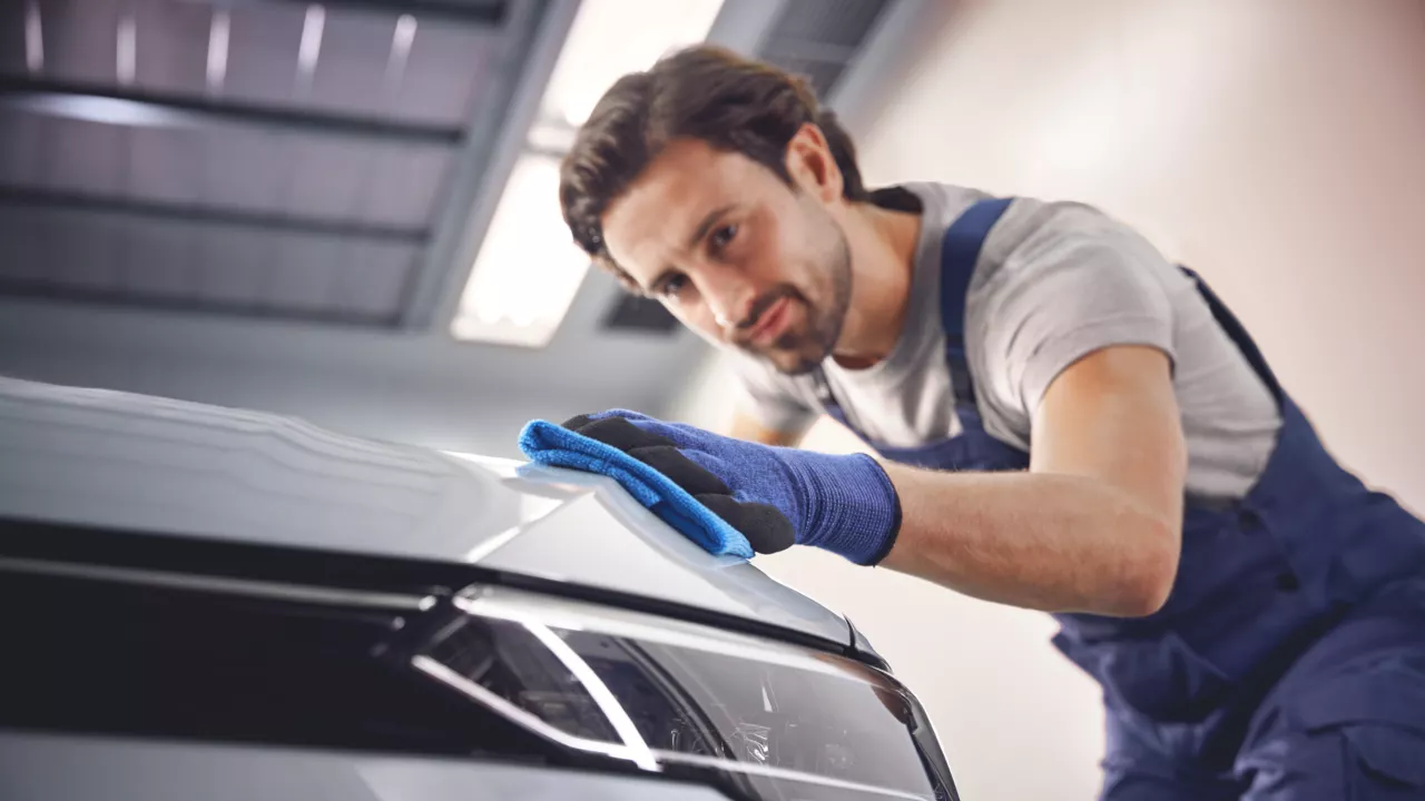 A Volkswagen technician carrying out an approved body repair