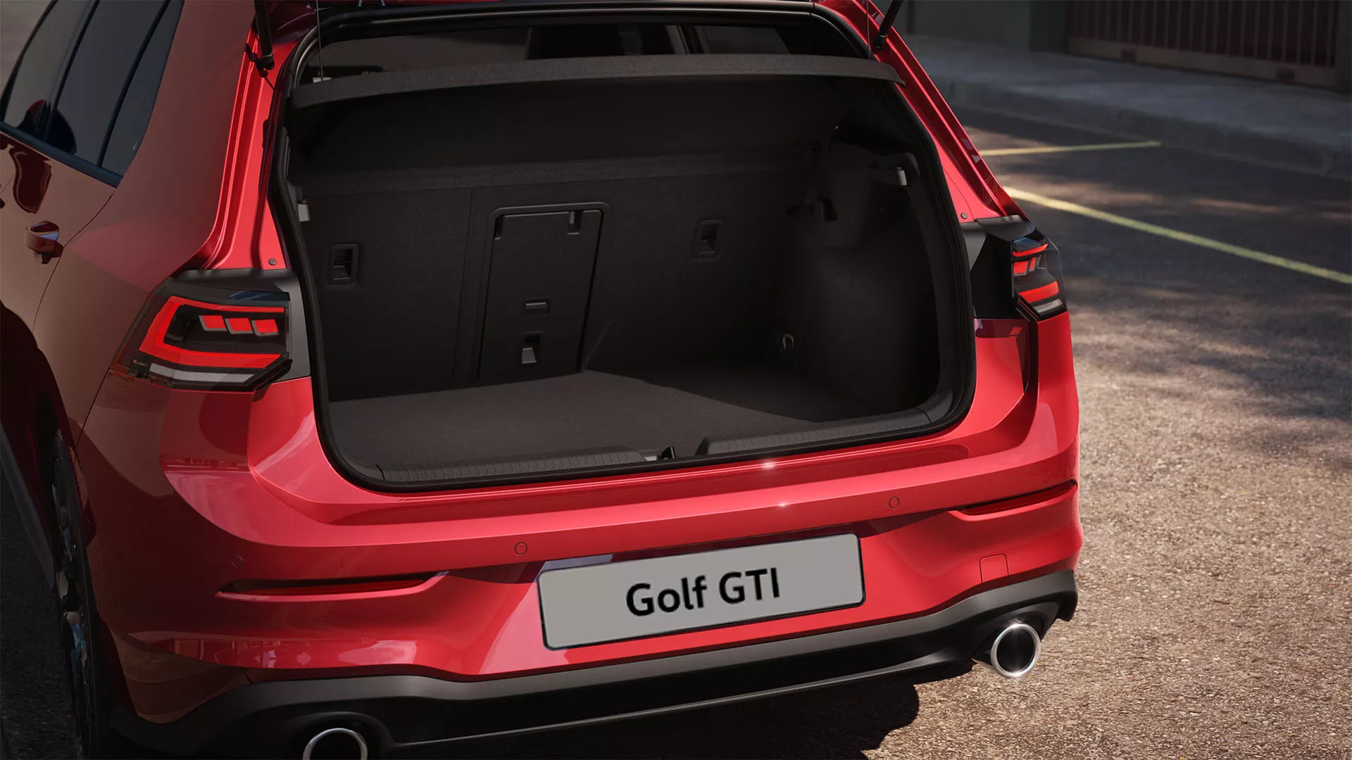 Interior view of the VW Golf with view of the steering wheel and cockpit from the driver's seat.