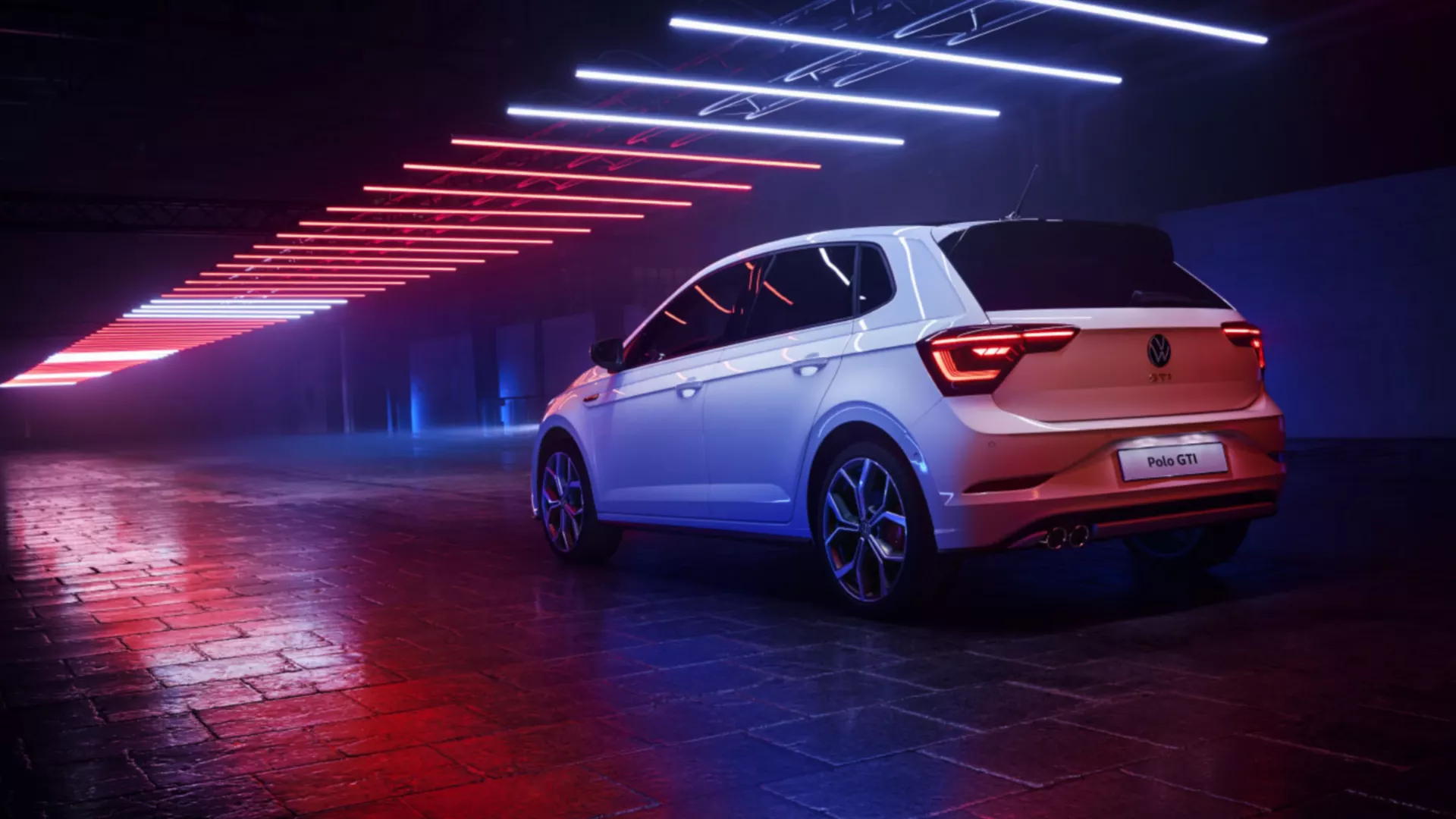 A white VW Polo GTI is standing in a hall with the LED matrix tail lights