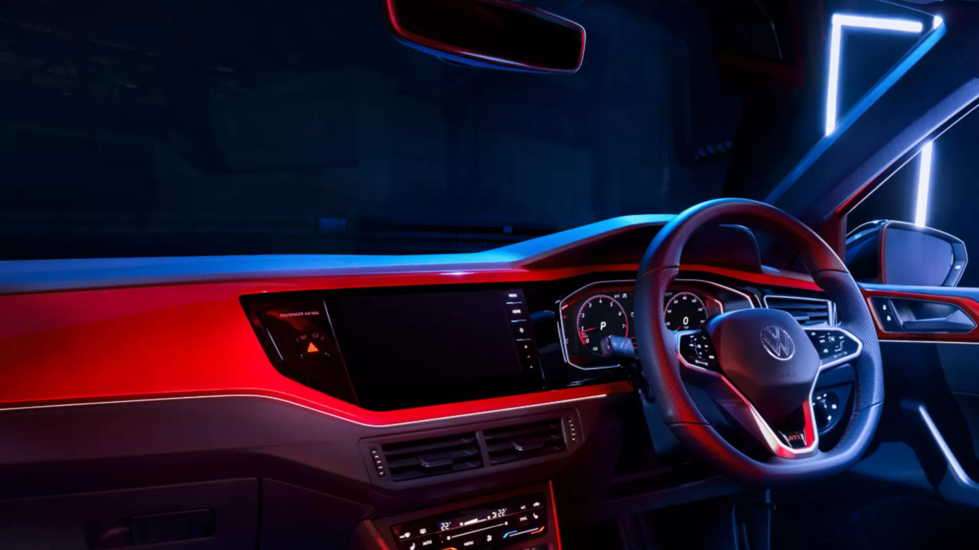 View from the back seat into the cockpit of the VW Polo GTI with the multifunction steering wheel, Digital Cockpit Pro and optional Climatronic.
