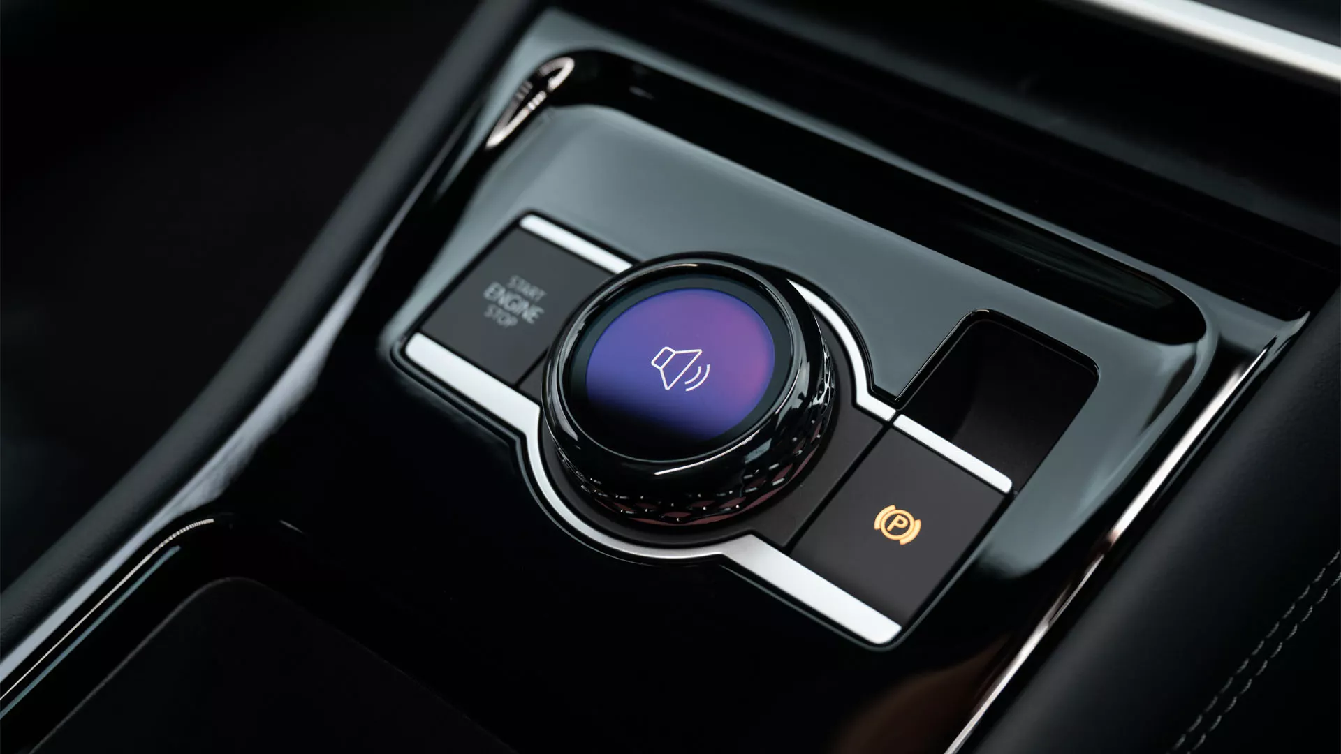 Detailed view of the interior of the VW Tiguan focusing on the centre console with the driving experience switch.