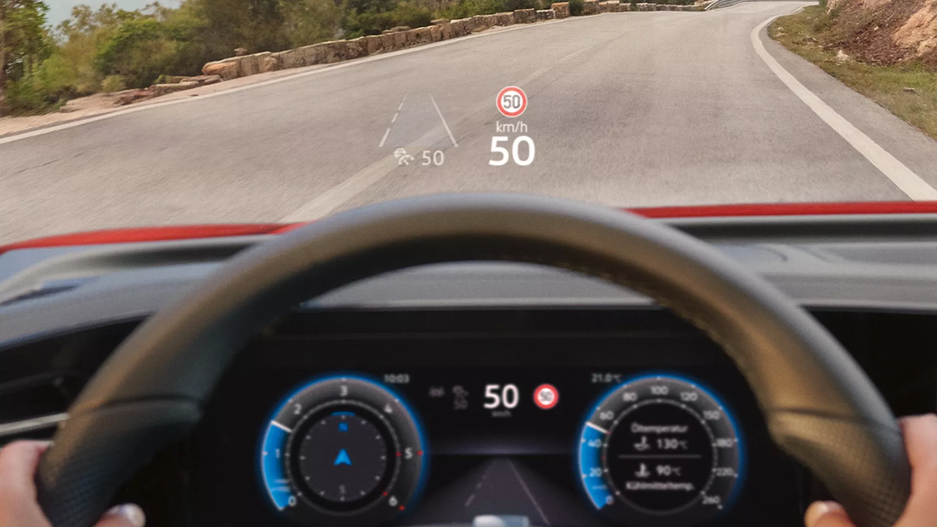 Detailed view of the steering wheel and head-up display in the VW Tiguan.